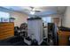 Unfinished basement bedroom with dresser and ceiling fan at 304 Ridge Hill Cir, Canton, GA 30115