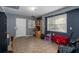 Finished basement area with tiled floor and exterior access at 304 Ridge Hill Cir, Canton, GA 30115