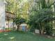 Large backyard with deck, shed, and lush greenery at 304 Ridge Hill Cir, Canton, GA 30115