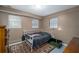 Cozy basement bedroom with double bed and ample natural light at 304 Ridge Hill Cir, Canton, GA 30115