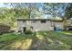House backyard with green grass and trees at 2210 Rhinehill Se Rd, Atlanta, GA 30315