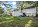 House backyard with green grass and trees at 2210 Rhinehill Se Rd, Atlanta, GA 30315