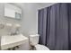 Simple bathroom with shower, sink, and toilet at 2210 Rhinehill Se Rd, Atlanta, GA 30315