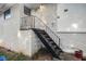 Back exterior showing steps and brick wall at 2210 Rhinehill Se Rd, Atlanta, GA 30315