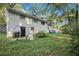 House backyard with patio, grill and trees at 2210 Rhinehill Se Rd, Atlanta, GA 30315