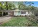 Charming ranch home with covered carport and mature trees at 2210 Rhinehill Se Rd, Atlanta, GA 30315