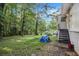 House backyard with green grass and trees at 2210 Rhinehill Se Rd, Atlanta, GA 30315