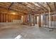 Unfinished basement with exposed framing and wiring at 110 Big Elk Sw Ct, Atlanta, GA 30349