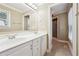 Double vanity bathroom with a large mirror and tile floor at 2401 Pinkney Dr, Marietta, GA 30062