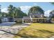 House exterior showing front yard, driveway, and detached garage at 2401 Pinkney Dr, Marietta, GA 30062