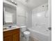 Bathroom with a tub, shower, and wood vanity at 104 Silver Fox Trl, Dallas, GA 30157