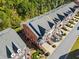 Aerial view of townhouses with tree-lined surroundings at 1281 Creekside Se Pl, Smyrna, GA 30082