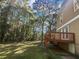 Wooden deck overlooking a wooded backyard at 2988 Woodrow Mnr, Lithonia, GA 30038