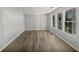 Spacious living room with neutral walls and vinyl flooring at 2988 Woodrow Mnr, Lithonia, GA 30038