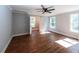 Spacious bedroom with hardwood floors and large windows at 140 Walker Woods Dr, Carrollton, GA 30116