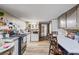 Kitchen with ample counter space and an eat-in area at 422 White Oak Nw Dr, Lilburn, GA 30047
