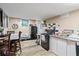 Kitchen with island, stove, and refrigerator at 422 White Oak Nw Dr, Lilburn, GA 30047