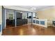 Bright dining room with hardwood floors and a view into the kitchen at 422 White Oak Nw Dr, Lilburn, GA 30047