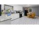 Kitchen with white cabinets, granite countertops, and tile floors at 422 White Oak Nw Dr, Lilburn, GA 30047