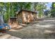Brick ranch house with gazebo and wooded backyard at 422 White Oak Nw Dr, Lilburn, GA 30047
