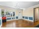 Spacious living room with hardwood floors and a large window at 422 White Oak Nw Dr, Lilburn, GA 30047