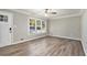 Bright living room with hardwood floors and crown molding at 2434 Miriam Ln, Decatur, GA 30032