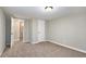 Basement bedroom with carpet and access to a full bathroom at 2434 Miriam Ln, Decatur, GA 30032