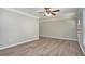 Spacious living room with hardwood floors and ceiling fan at 2434 Miriam Ln, Decatur, GA 30032