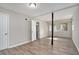 Spacious bedroom with vinyl flooring and a large window at 2434 Miriam Ln, Decatur, GA 30032