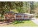 Ranch-style brick home with white porch at 504 Milligan Dr, Stone Mountain, GA 30083