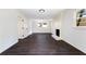 Living room with fireplace and dark hardwood floors at 504 Milligan Dr, Stone Mountain, GA 30083
