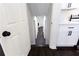 View down basement stairs with dark hardwood floors at 504 Milligan Dr, Stone Mountain, GA 30083