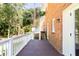 Spacious deck overlooking wooded backyard at 504 Milligan Dr, Stone Mountain, GA 30083