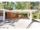 Covered carport with attached porch at 504 Milligan Dr, Stone Mountain, GA 30083