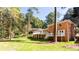 House with large backyard and deck at 504 Milligan Dr, Stone Mountain, GA 30083