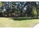 Wooded lot with a grassy area at 6482 Sinclair Pl, Morrow, GA 30260