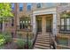 Brick townhouse exterior with two front doors and a staircase at 2380 Crescent Park Ct # 4, Atlanta, GA 30339