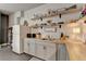 Well-equipped kitchen featuring butcher block countertops and ample storage at 5855 Windjammer Pt, Cumming, GA 30041