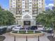 Luxury high-rise building with a fountain and ample parking at 799 Hammond Dr # 205, Sandy Springs, GA 30328