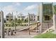Community playground with wooden play structures at 185 Roycroft Ln, Fayetteville, GA 30214
