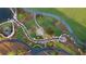 Aerial view of a landscaped walking path with a stream at 185 Roycroft Ln, Fayetteville, GA 30214