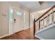 Bright entryway with hardwood floors and staircase at 2459 Jacks View Ct, Snellville, GA 30078