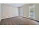 Spacious carpeted bedroom with two large windows at 2459 Jacks View Ct, Snellville, GA 30078