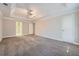 Main bedroom with trey ceiling and access to bathroom at 2459 Jacks View Ct, Snellville, GA 30078