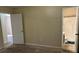 Bedroom with access to bathroom and hallway at 6883 Lakeshore Dr, Douglasville, GA 30135