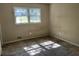 Spacious bedroom with large windows and wall-to-wall carpet at 6883 Lakeshore Dr, Douglasville, GA 30135