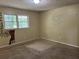 Bedroom with nature mural and window at 6883 Lakeshore Dr, Douglasville, GA 30135