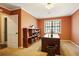 Bright home office with built-in shelving and large desk at 760 Stone Harbor Sw Pkwy, Marietta, GA 30060