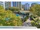 Communal pool and courtyard area with landscaping at 44 Peachtree Nw Pl # 834, Atlanta, GA 30309