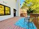 Deck with seating area and wooded backdrop at 430 Thornbush Trce, Lawrenceville, GA 30046